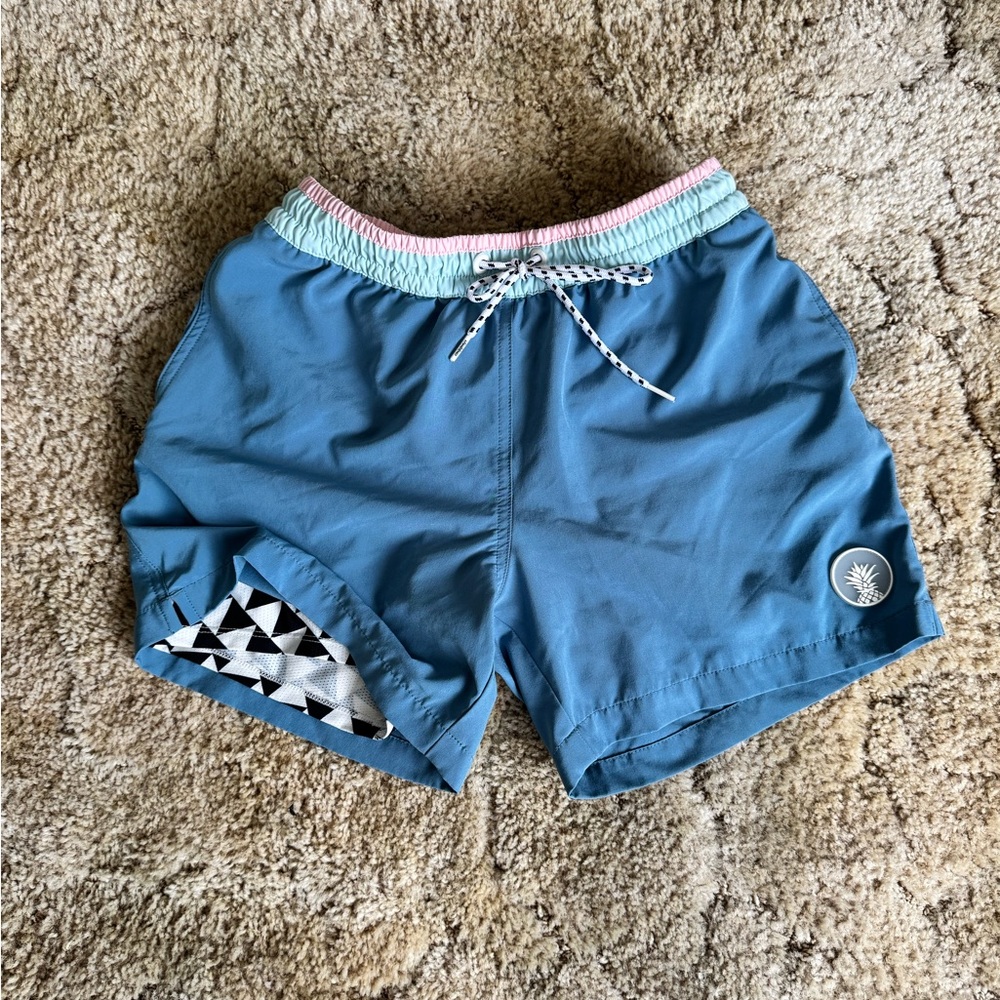 chubbies Blue Swim Trunks with Pink and Mint Waistband